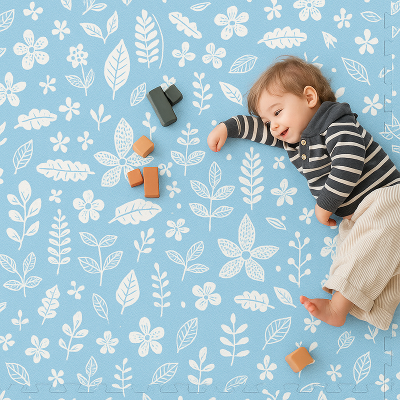 Baby playing on PopsyKosy Tranquil Flower Ocean Blue EVA foam mat in modern living room