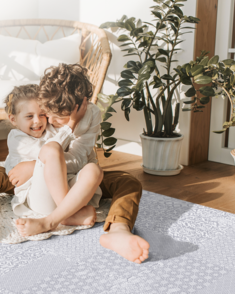 Totem - Gray play mat in a portrait family floor-time scene